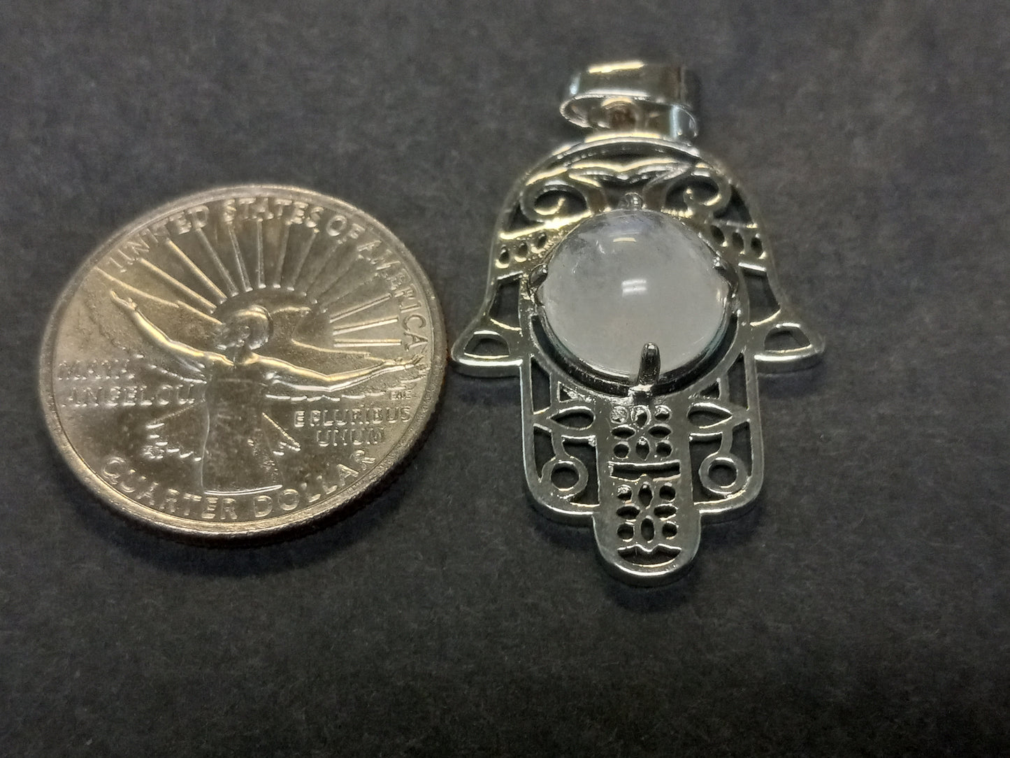 Clear Quartz Hamsa Hand Pendant